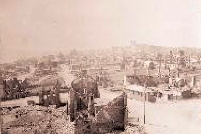 Shells of burned-out buildings scar the downtown after the Great Fire of 1892.