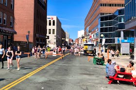 Many businesses in the area of the Water Street pedestrian mall built patios out onto parts of the street during the summer. On Monday, the city extended the period during which they can keep those patios in place until Nov. 1. -TELEGRAM FILE PHOTO