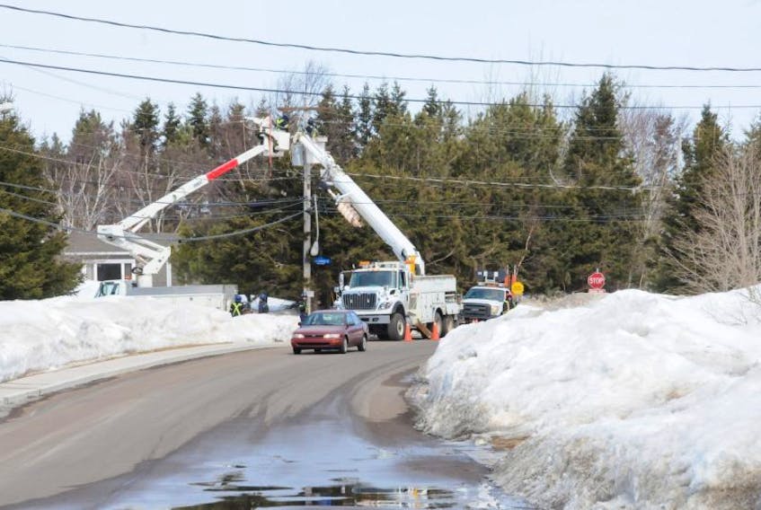 <p>Crews with the City of Summerside’s power utility work to repair equipment at the intersection of Flamingo Drive and Small Avenue. Damage to the lines in this area caused damage further up the system, which forced a city-wide blackout for about 20 minutes on Monday. Some areas were without power several hours. Colin MacLean/Journal Pioneer</p>