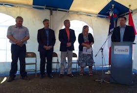 West Nova MP Colin Fraser (right, at microphone) makes announcement Wednesday morning in Meteghan River.<br />CARLA ALLEN PHOTO