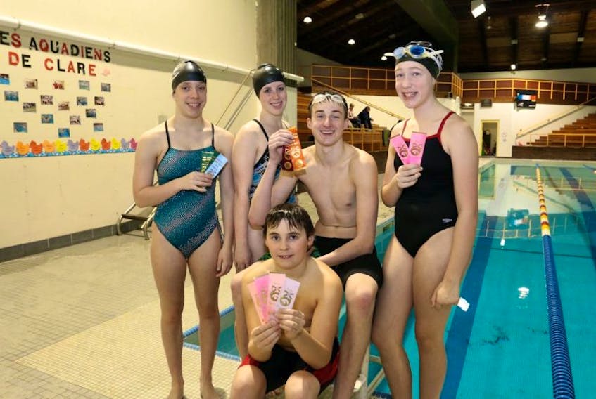 <p>Mattea LeBlanc, left, Raianne McNeil, Nick Theriault, Anya Vanclief and Joel Comeau of the Les Aquadiens de Clare swim team competed in the Nova Scotia Senior Open swim meet in Truro.</p>