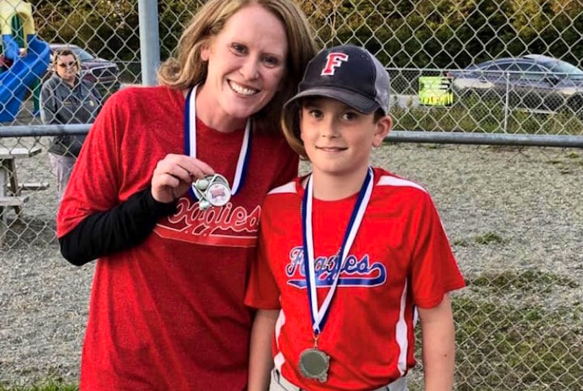 Karen Stoddard and her son Nolan pose for a photo at the end of the 2019 CHAMBA season. Stoddard has been chosen as the 2021 Representative Volunteer of the Year  by the Town of Clark’s Harbour. Contributed