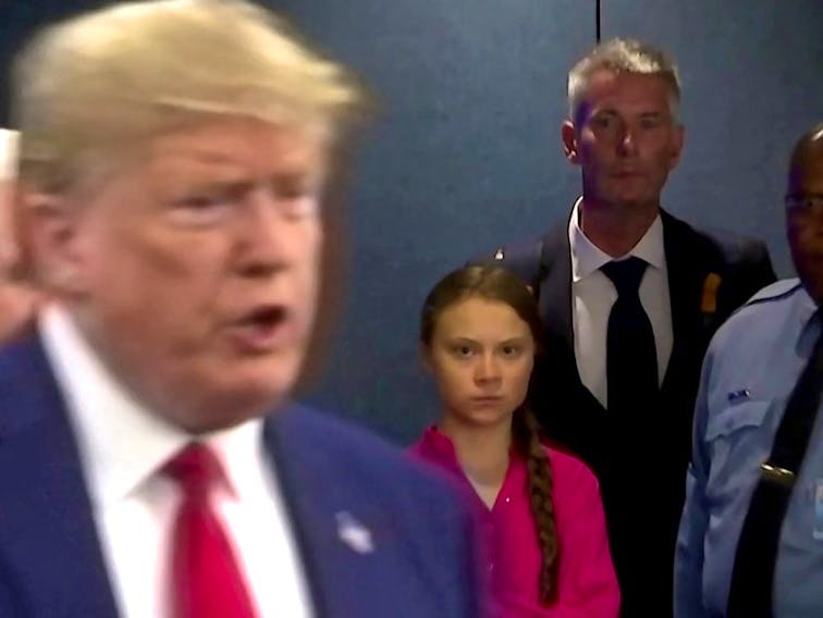 Swedish environmental activist Greta Thunberg watches as U.S. President Donald Trump enters the United Nations to speak with reporters in a still image from video taken in New York City, U.S. September 23, 2019.  