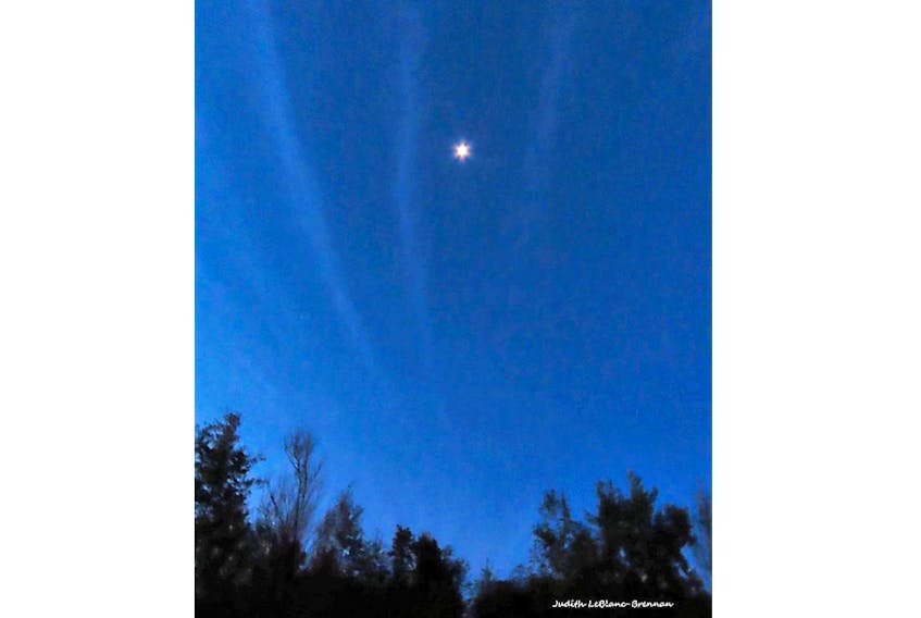 This lovely pattern in the sky greeted Judy LeBlanc-Brennan before the sun came up over Cape Breton NS.  It was a subtle reminder of a powerful storm spiralling hundreds of kilometres offshore.