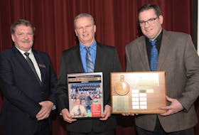Rob McCormack, centre, receives the P.E.I. Mutual Insurance coach of the year award from Sport PEI board member Ron Waite, left, and Kendall Docherty, P.E.I. Mutual Insurance representative.
Phil Matusiewicz/Special to The Guardian
