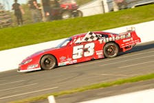 Cole Butcher takes the checkered flag after winning the Jim Hallahan 250 as the Parts For Trucks Pro Stock Tour returned to racing on Saturday at Scotia Speedworld.  Mike McCarthy