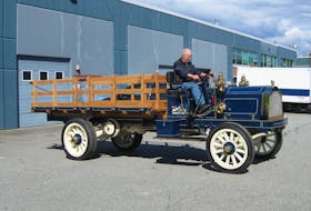 Paul Carter at the wheel of his newly restored 1909 Packard three-ton truck – the oldest known Packard truck.— Alyn Edwards