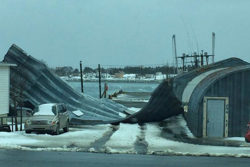Strong winds overturned a section of this Quonset hut located at the government wharf in Bay Roberts early Saturday afternoon.