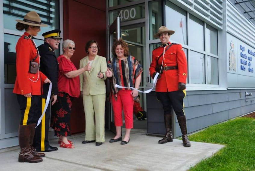 A ribbon was cut Monday afternoon to officially open the new Whitbourne RCMP detachment. From the left are Const. Sarah Bass, Assistant Commissioner Peter Clarke (RCMP commanding officer for Newfoundland and Labrador), Mayor Hilda Whelan, MP Judy Foote, MHA Sherry Gambin-Walsh and Const. Robert Munroe.