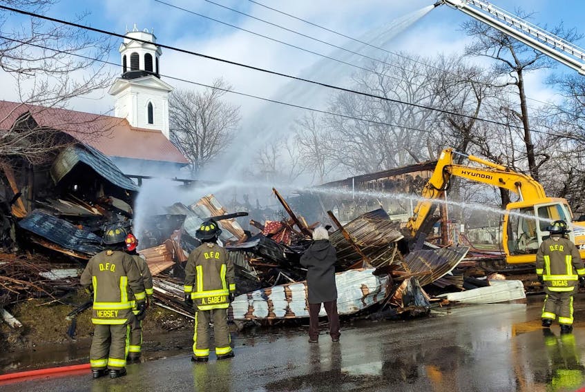 This was the scene Monday morning, Feb. 24, after a fire destroyed the church hall belonging to the Grace United Church in Digby. While it did sustain fire and smoke damage, the church itself was still standing thanks to the efforts of firefighters. KARLA KELLY PHOTO