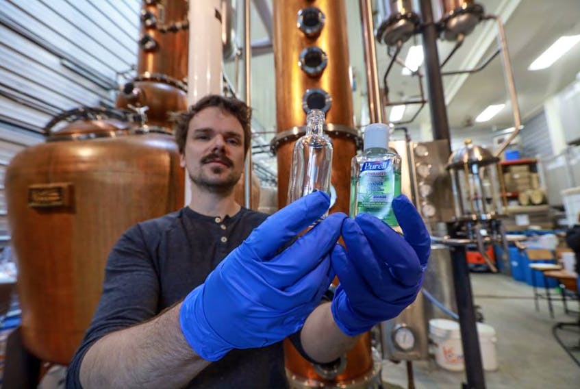 Alex Wrathell, with Compass Distillery in Halifax, and his staff are currently making sanitizer.
