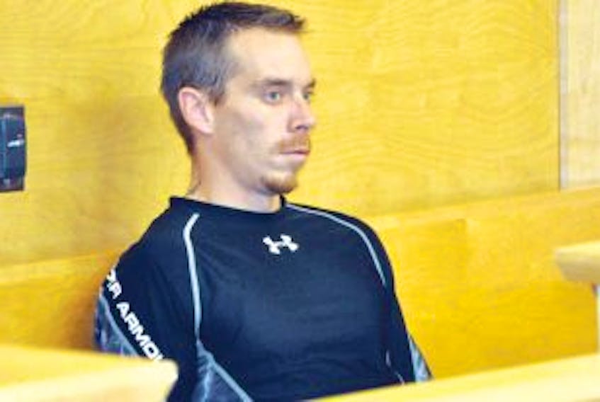 ['Conrad Crocker of Trout River is seen in provincial court in Corner Brook in this July 2012 file photo.']