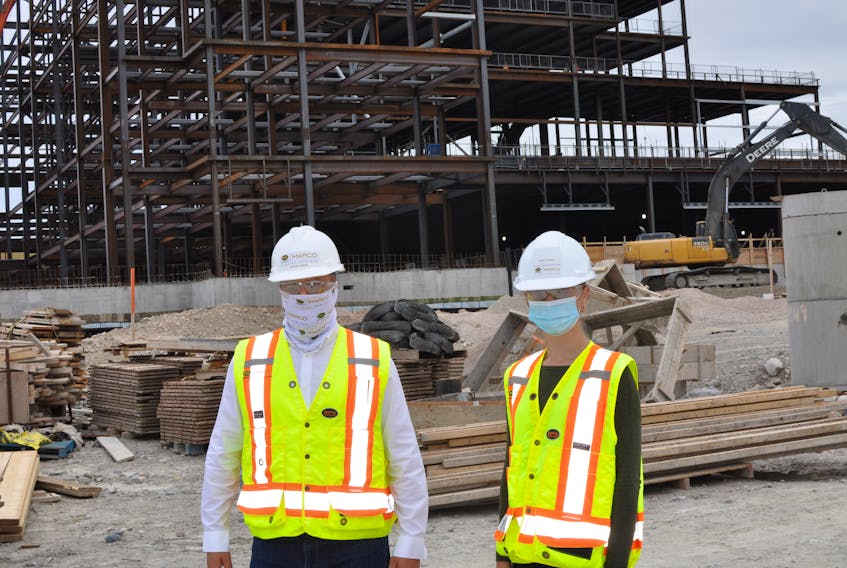Charles Gunning (left) senior project manager with PCL/Marco on the new hospital build in Corner Brook and co-op student Kate Tucker took SaltWire Network on a tour of the facility on Tuesday. — Diane Crocker/SaltWire Network