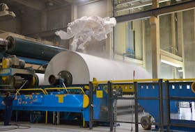 Supercalendered paper comes off a roll at Port Hawkesbury paper in this file photo. NANCY KING/CAPE BRETON POST