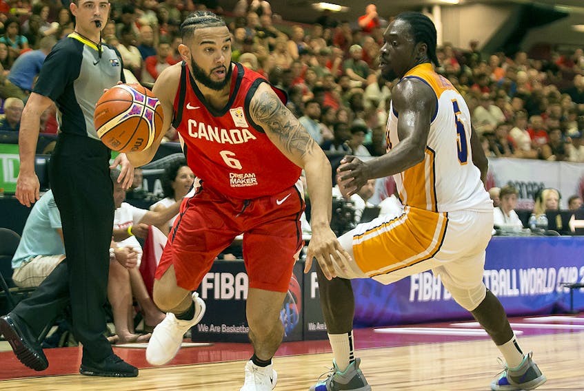 Canada's Cory Joseph (6) drives past the Virgin Islands' Khalid Hart (5) during FIBA World Cup qualifier action at TD Arena. July 2, 2018. (Errol McGihon/Postmedia)