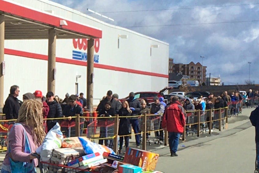 A crowded lineup is seen at the Costco in Bayers Lake on Monday. Similar scenes have been reported up until Wednesday evening in contravention of the COVID-19 social distancing law. - Gordon Delaney