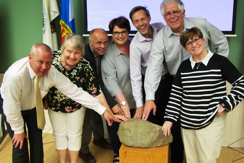 Antigonish Town Council poses for a photo around the rock which will be their contribution to the special cairn being created for the Special Olympics Canada 2018 Summer Games, coming to Antigonish July 31 to Aug. 4. Pictured during their May 28 meeting is council members; councillor Donnie MacInnis (left), Deputy Mayor Diane Roberts, councillors Willie Cormier, Mary Farrell, Andrew Murray, Jack MacPherson and Mayor Laurie Boucher. Richard MacKenzie