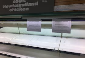 A St. John's grocery store sign Wednesday on a cooler shelf emptied of chicken. BARB SWEET/THE TELEGRAM