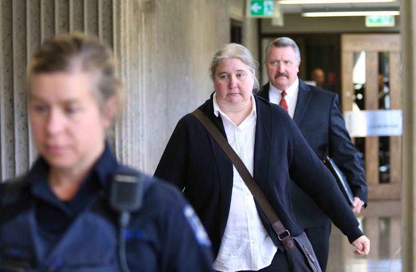 Halifax Regional Police special constables Cheryl Gardner and Dan Fraser leave Nova Scotia Supreme Court during a break at their jury trial on a charge of criminal negligence causing death, in Halifax on Monday, Oct. 28, 2019.