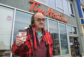 James K. MacFarlane, a north end Charlotte Street resident, is a frequent daily visitor to the Tim Hortons store on Charlotte Street in Sydney. This Tim's location will close permanently at the end of the day on Friday afternoon, the first COVID-19 business casualty in downtown Sydney. CHRIS SHANNON • CAPE BRETON POST
