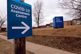 A signs points to a COVID-19 assessment facility up at the Nova Scotia Hospital in Dartmouth. - Eric Wynne