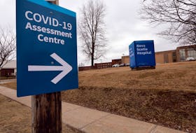 A signs points to a COVID-19 assessment facility up at the Nova Scotia Hospital in Dartmouth. - Eric Wynne