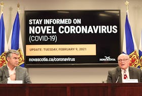 Premier Stephen McNeil and Dr. Robert Strang, Nova Scotia’s chief medical officer of health, speak at a COVID-19 news briefing on Tuesday, Feb. 9, 2021.