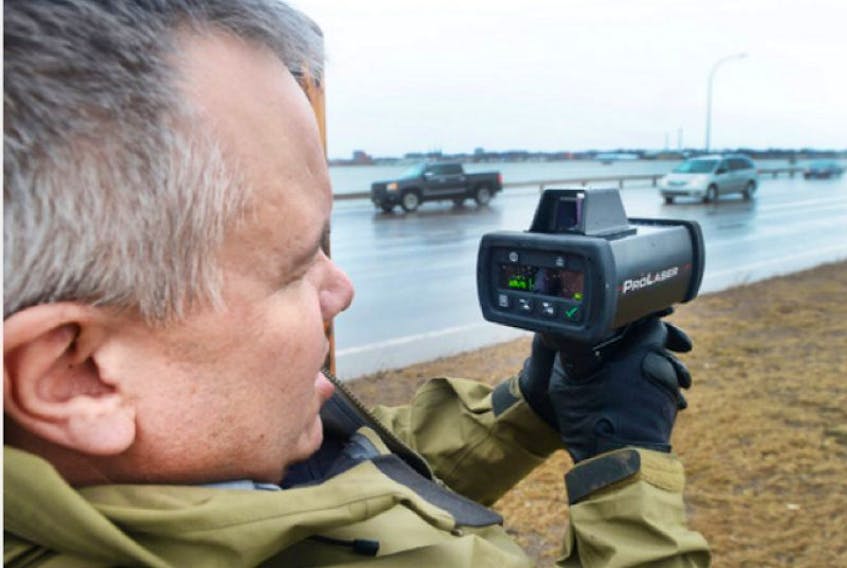 Chris Gunn uses a LiDAR speed gun to measure vehicle speed as it goes over Hillsborough Bridge recently. The RCMP did speed checks in Cornwall and Stratford using four to five police vehicles to stop speeders in each area as part of its regular monitoring of traffic. RCMP Staff Sgt. Mark Crowther says more action is coming to nab speeders on the bridge and in Stratford