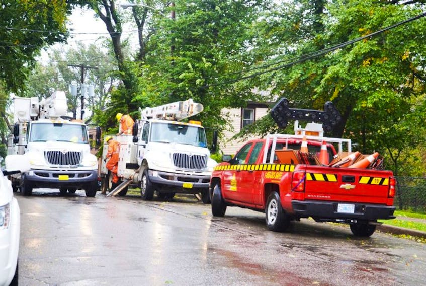 Nova Scotia Power crews were kept busy across the island Monday as high winds and rain caused a number of outages, including along Yorke Street in Sydney.