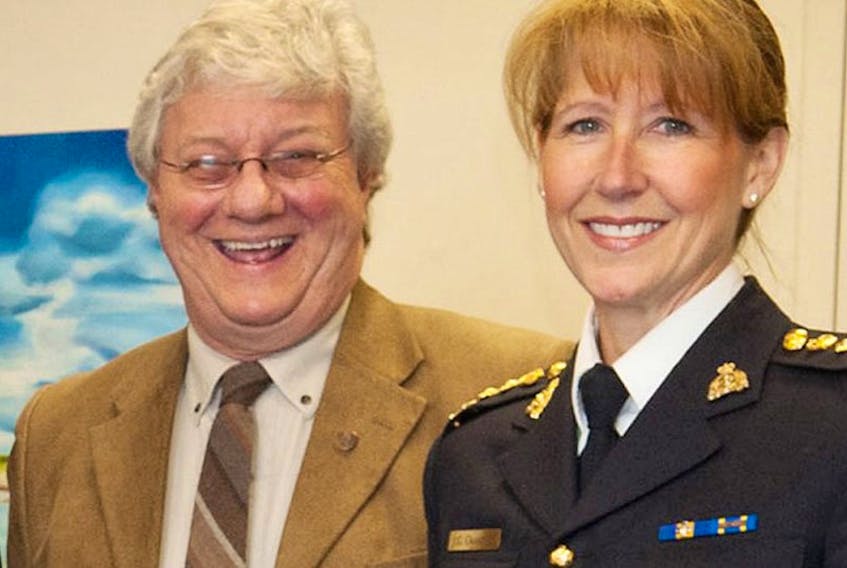 <p><span class="BodyText">Don Reid of P.E.I. Crime Stoppers, chats with Chief Superintendent Joanne Crampton, commanding officer of the RCMP on Prince Edward Island, during a recent event to raise awareness of the Crime Stoppers program on P.E.I. It allows Islanders to report information about a crime, or potential crime, without providing their name, and without fear of reprisal and earn a cash reward in the process.</span></p>
<div><span class="BodyText"><br /></span></div>