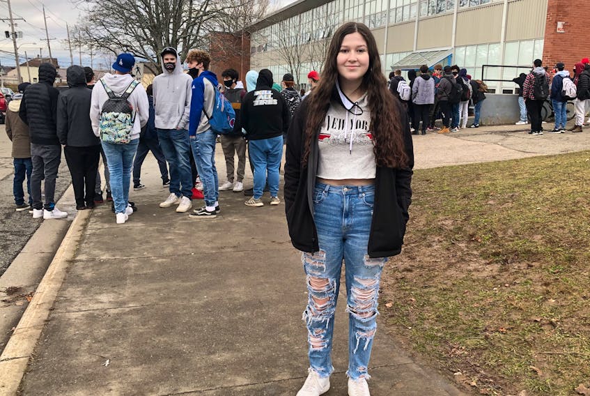 Chloe Feltham, above, helped organize an impromptu protest that started outside Sydney Academy Thursday during lunch hour. The student’s were protesting a school dress code which Feltham believes unnecessarily sexualized parts of female bodies. NICOLE SULLIVAN/CAPE BRETON POST