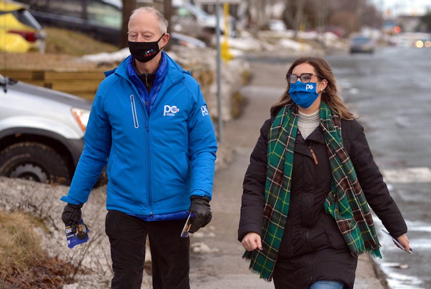 Progressive Conservative Leader Ches Crosbie goes door to door on Canada Drive Tuesday afternoon with St. John’s West candidate Kristina Ennis. Keith Gosse/The Telegram