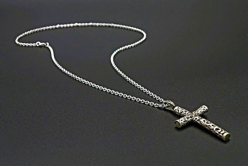 Stock image of crucifix neck chain.