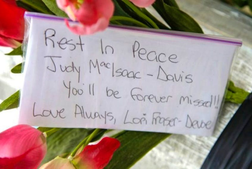 A note is left with some flowers at the corner of Thistle Street and Victoria Avenue in Dartmouth. &nbsp; &nbsp; &nbsp; &nbsp; &nbsp; &nbsp; &nbsp; &nbsp;