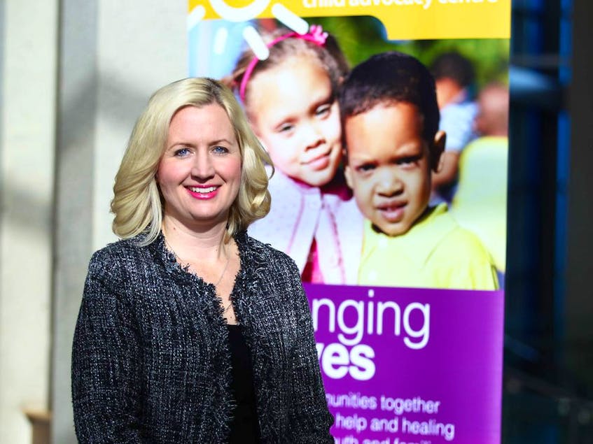 Sara Austin, CEO of Children First Canada, poses for a photo in northeast Calgary in 2017. - Postmedia News