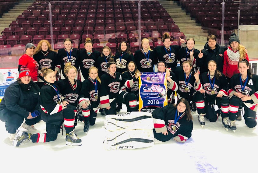 The Capital District Cyclones of Charlottetown won the Consolidated Credit Union bantam A female hockey tournament in Summerside last weekend. Members of the Cyclones are Bella Scott, front, and kneeling, from left: Maggie Connell (coach), Abby Rodgerson, Bella Reardon, Sophie Fay, Bella Coffin, Kayla Gallant, Makenna Munn, JD Johnson, Clare Bowie and Sara Bain. Back row: Lindsay Arsenault (coach), Emily Smith, Hailey Murphy, Marley McGonnell, Sara Scantlebury, Jordyn Doucette, Reagan Bolger, Ema Gibbons, Alexis Myers, Lee Ann DesChamps and Lyndsey Flynn (coaches).