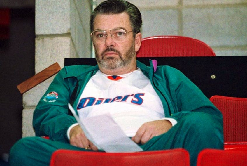 Oilers scout Barry Fraser sits in the stands at the Northlands Coliseum circa 1990. 