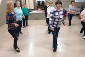 Members of the Black Rock line dancers practise their steps during a pre-COVID get-together at the Big Bras d’Or fire hall. Nowadays, the group keeps up with the latest moves during a twice-weekly online practice session. CONTRIBUTED