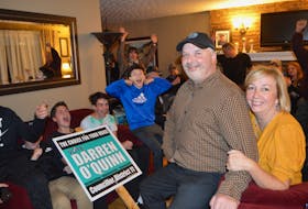 Darren O’Quinn, 50, of New Waterford, celebrates winning the District 11 seat in the Cape Breton Regional Municipality election race with wife Nancy, family and friends, shortly after the election results were released Saturday evening. Sharon Montgomery/Cape Breton Post 