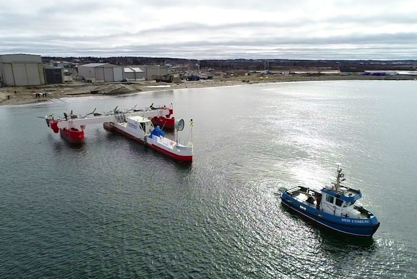 A floating tidal-energy platform is towed from the A.F. Theriault & Son Ltd. manufacturing facility in Meteghan. The platform was put in place on Monday in the Bay of Fundy's Grand Passage, Digby Neck, by Sustainable Marine Energy Ltd. The Dartmouth company plans to use the new platform as a template for creating the world’s first floating tidal energy array. 
