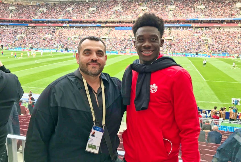 Edmonton soccer product Alphonso  Davies, who plays for Bundesliga club Bayern Munich, poses with family friend-turned agent Nick Huoseh in this undated photo.