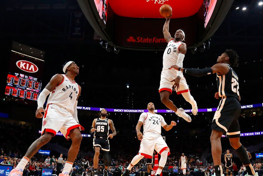 Raptors’ Terence Davis dunks during Monday’s win over the Hawks in Atlanta. (GETTY IMAGES)