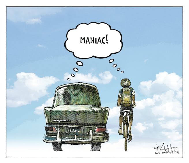 Cartoonist Michael de Adder's take on motorist-cyclist tensions in HRM, published July 31, 2019.