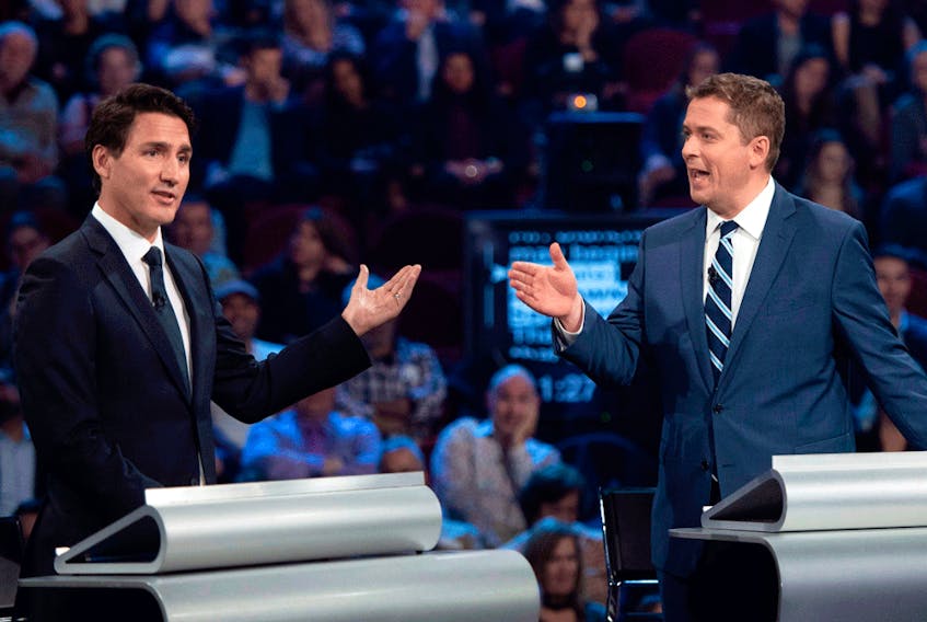 Liberal Leader Justin Trudeau and Conservative Leader Andrew Scheer during the Federal Leaders Debate in Gatineau, Quebec on Oct. 7, 2019.
