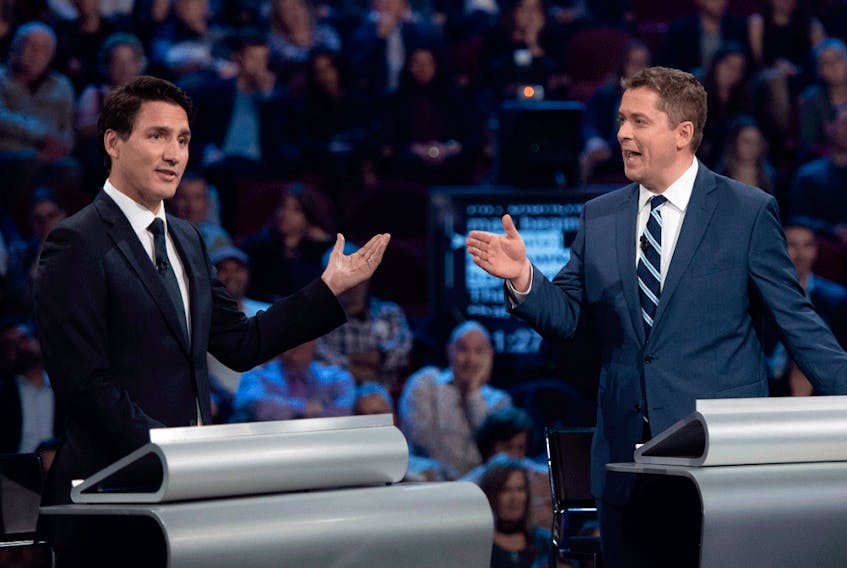 Conservative Leader Andrew Scheer and Liberal Leader Justin Trudeau argue a point at the English-language leaders' debate on Oct. 7, 2019.
