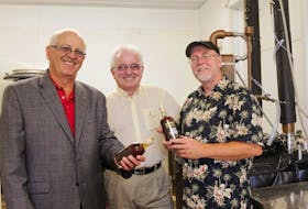 <p><span>Deep Roots Distillery is a new venture on P.E.I. Attending the opening in Warren Grove are, from left, George Webster, minister of agriculture and forestry, Bush Dumville, MLA for District 15, West Royalty - Springvale, and distillery founder Mike Beamish.<br /></span></p>