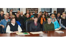 <span>Front, from left, Boyd Allen, Catherine O’Brien, and Don Mazer of the Coalition for the Protection of P.E.I. Water make a case against lifing the moratorium on deep-well irrigation to a provincial standing committee Thursday, Feb. 27, 2014. <br /></span>