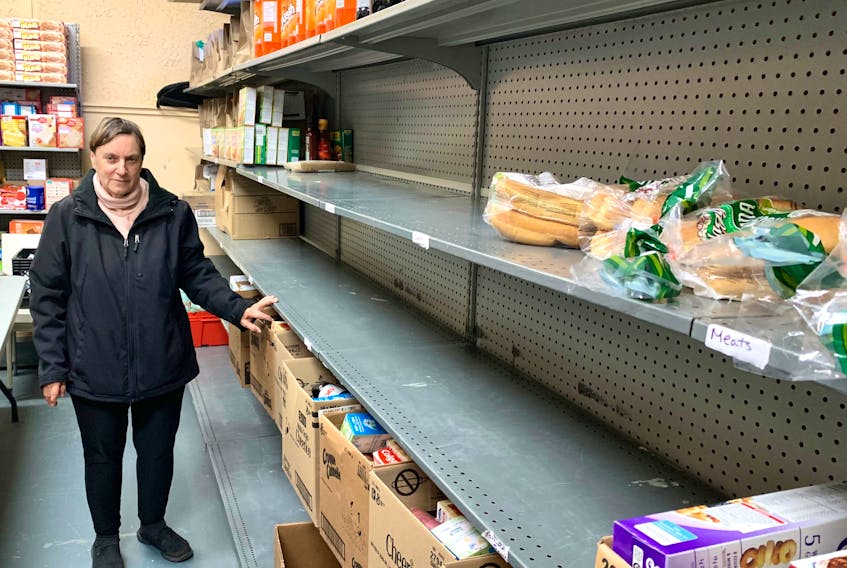 Madonna Galway, president of the Northeast Avalon Food Bank, said there are some empty shelves at the organization’s building, in the basement of the Holy Trinity Parish Hall in Torbay. She hopes as Christmas gets near, more people will donate cash and gift certificates. — ROSIE MULLALEY/The Telegram