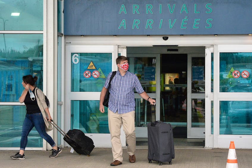 Passengers arrive at St. John's airport from Halifax. - Keith Gosse