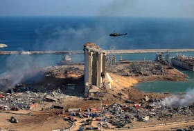  general view shows the damaged grain silos of Beirut's harbour and its surroundings on August 5, 2020, one day after a powerful twin explosion tore through Lebanon's capital, resulting from the ignition of a huge depot of ammonium nitrate at the city's main port. 